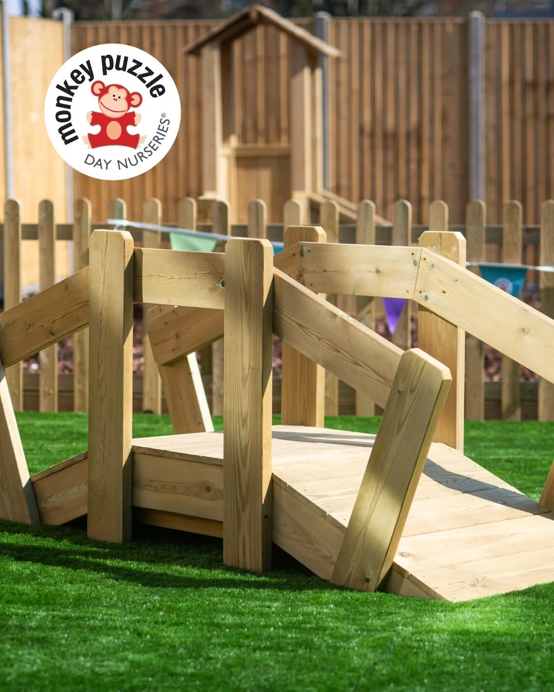 Timber bridge and slide in the nursery garden