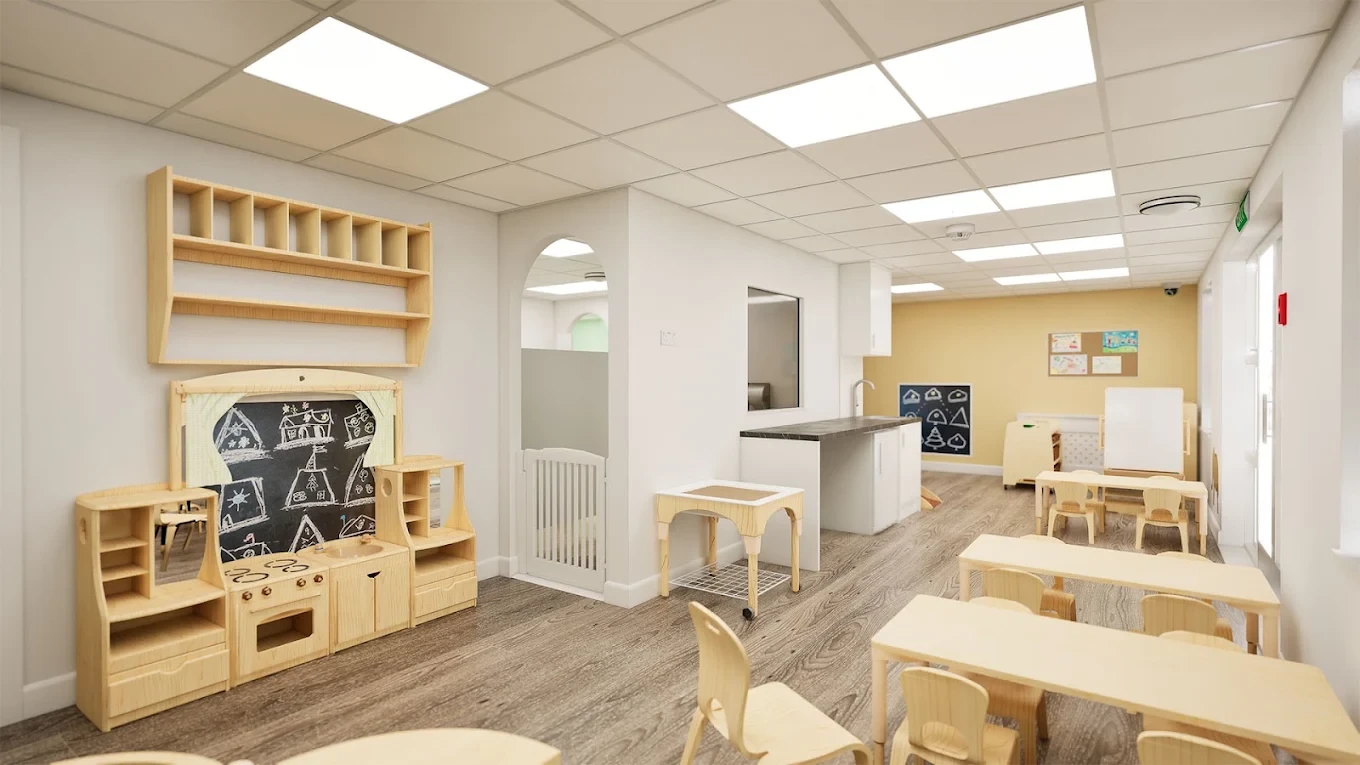 Nursery learning room with timber storage, activity tables and an arched doorway
