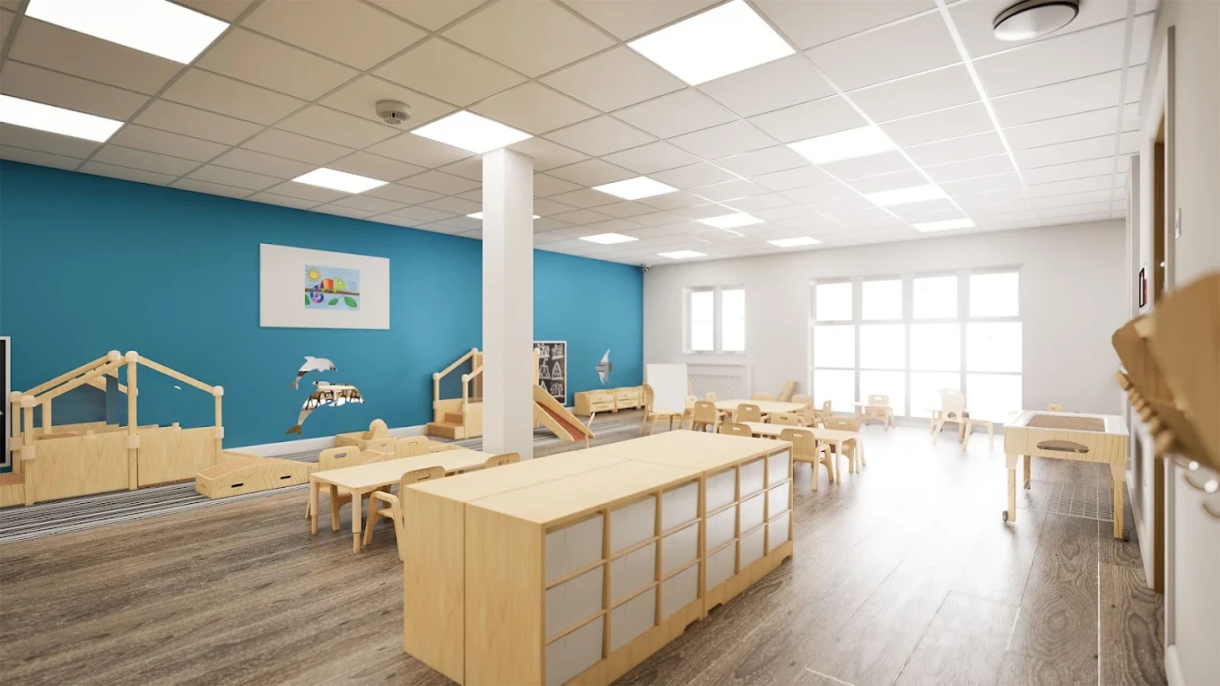 Lightwater nursery room with a teal wall, low shelving and timber climbing equipment