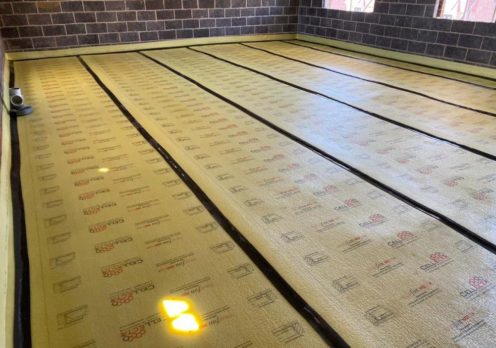Floor insulation laid before the next stage of the floor build-up.